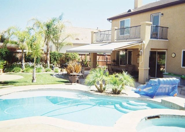 Retractable awning on Newport Beach home