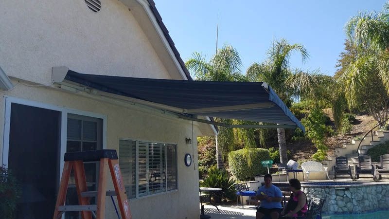 Retractable awning on Orange County home